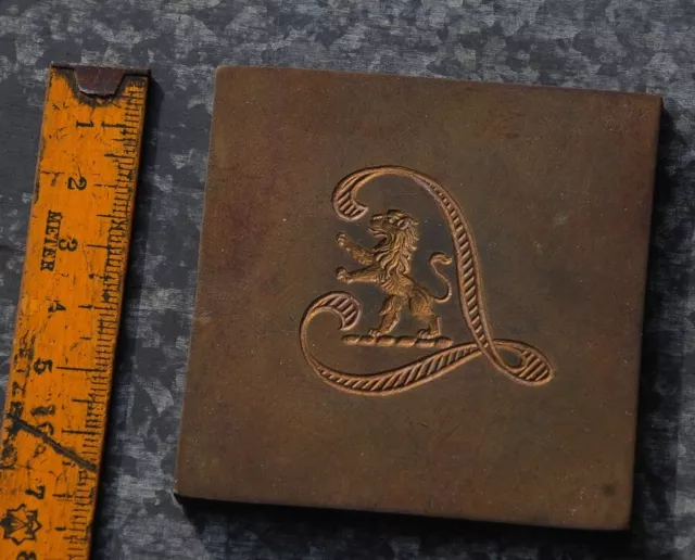 "L" brass ornament bookbinding gilding bookbinder embossing Art Nouveau lion