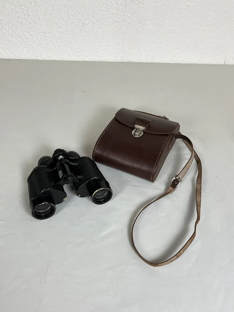 Ancienne paire de jumelle avec son étui en cuir Monclair Paris 8x32 fluorée