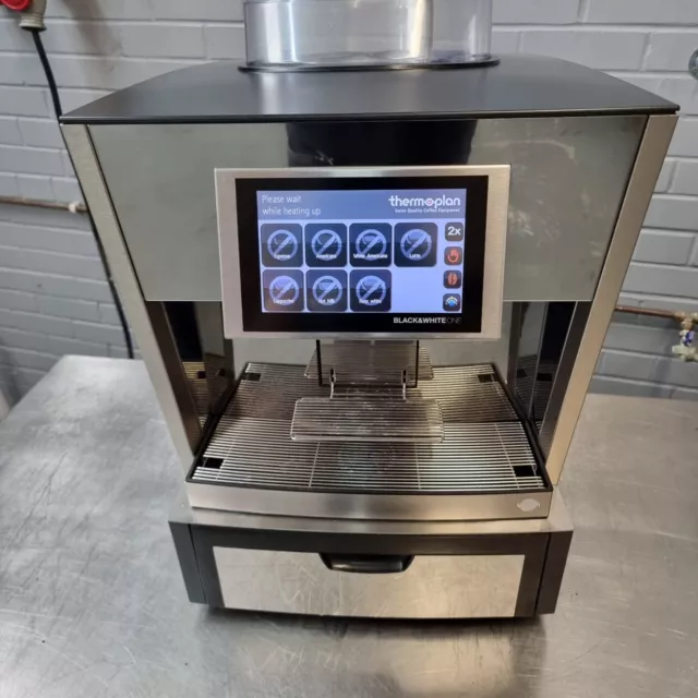 Thermoplan schwarz & weiß Espressomaschine für eine Tasse - Premiumqualität Thermoplan schwarz & weiß Espressomaschine für eine Tasse - Premiumqualität