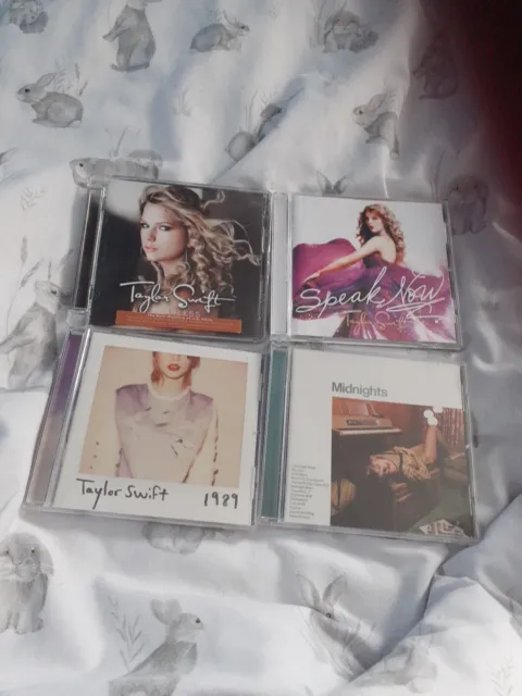 4 original Taylor Swift CD's. Fearless, Speak Now, 1989 and Midnights Jade Green