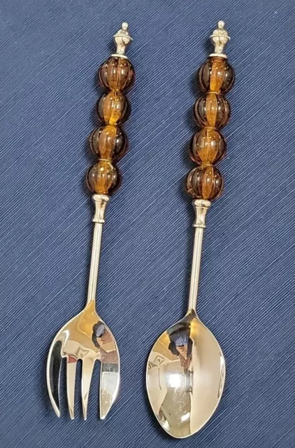 Juego de porciones para ensaladas, cuchara y tenedor, asas de acrílico ámbar y tono plateado