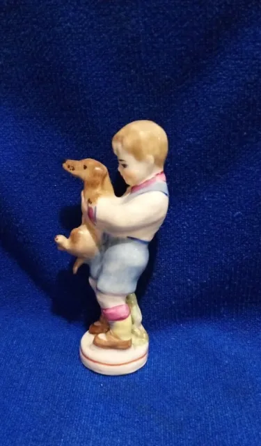 Niño soviético de la URSS con perro dachshund figura de porcelana rusa...