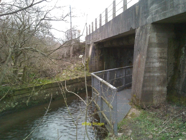 PHOTO 6X4 FOOTWAY Under Railway Bridge Lucker The Metalwork Carries A photo-6x4-footway-under-railway-bridge-lucker-the-metalwork-carries-a