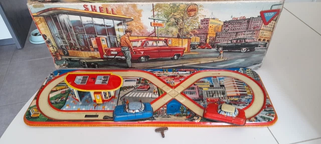 Ancien jouet moto mécanique - Atelier Watripont