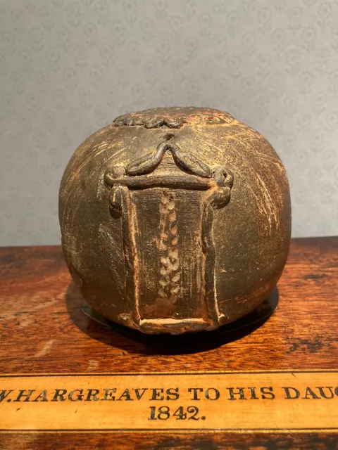 Unidentified Heavy Terracotta ? Pottery Ball With Mark 10 cms High….What is it ?