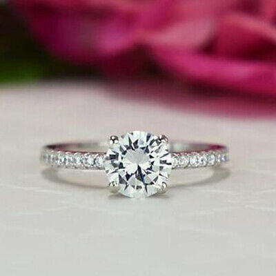 1.25Ct Round Solitaire with Accented Cut Four Prong Set Ring 14k White Gold Over