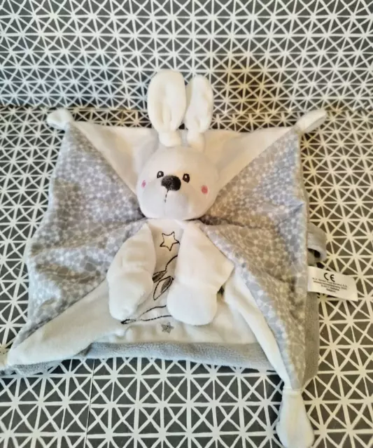 Doudou lapin plat blanc gris étoiles argentées attache tétine Simba Toys