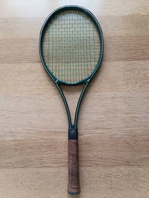 Ancienne raquette de tennis Snauwaert Lady Caravelle avec ça croix