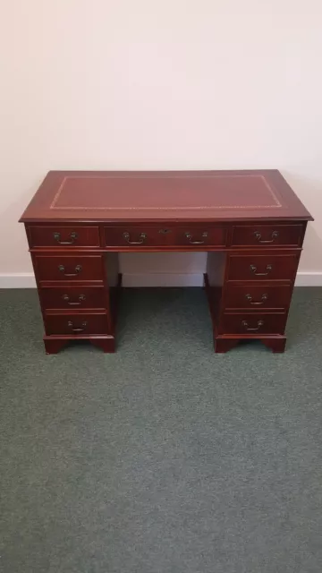 Reproduction Mahogany Antique Desk With Red Leather