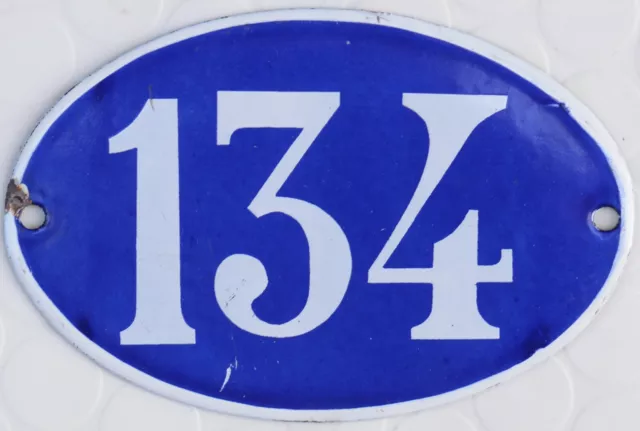 Old blue oval French house number 134 door gate plate plaque enamel steel sign