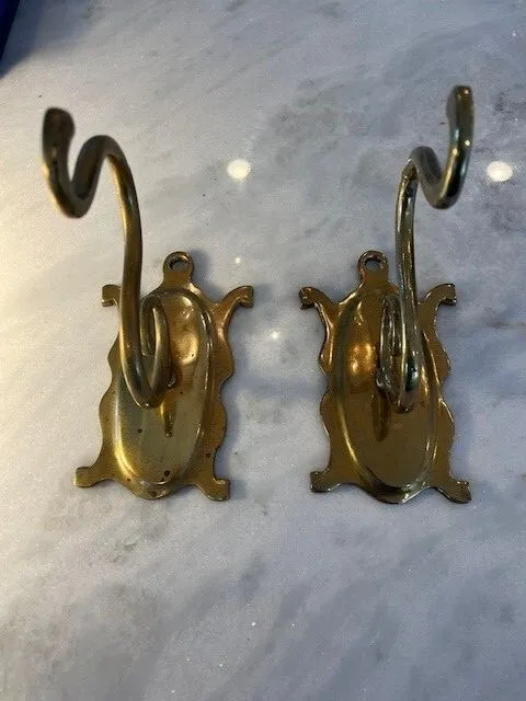 Pair of large antique 19th century brass hooks