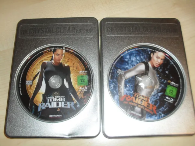 Lara Croft Tomb Raider 1 + Die Wiege des Lebens / 2 x Blu Ray Crystal Clear Edt.