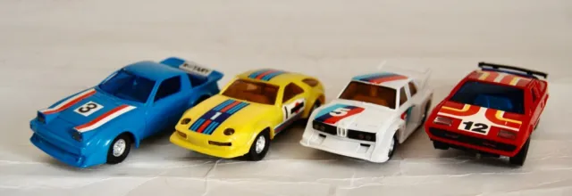 Vintage Slot Cars x4. BMW, Porsche, Lotus, Datsun All working with lights 1980's