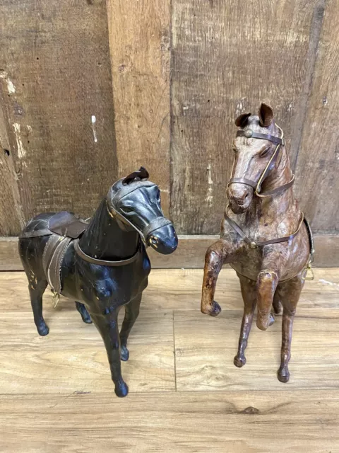 Pair Of Leather model of a horse possibly by Omersea for Liberty