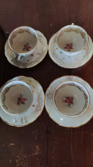 4 superbes tasses à café+ soucoupes en   porcelaine de Limoges signées F.D