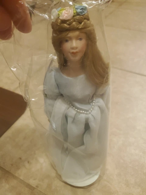 Avon Vintage Fairy Tale Doll Collection Cinderella Porcelain doll with stand