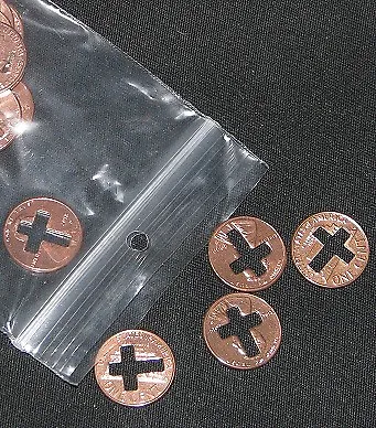 cross cut pennies, 50 pennies with a cross cut out of them