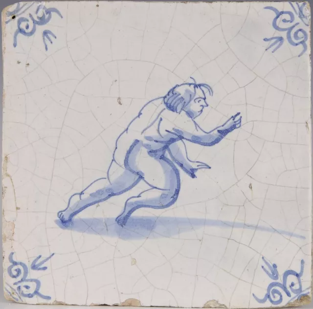 Nice Dutch Delft Blue tile, playing figure, mid 17th. century.