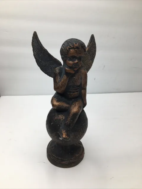 Vintage Cast Iron Sitting Angel Cherub On Ball Figurine Rusty Heavy