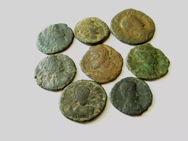 Lot of 8 genuine Ancient Roman bronze coins. AD 1500 + years