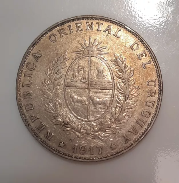 8. Ungraded 1917, Uruguay, Un Peso. Silver Coin