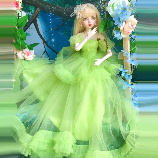 DOLL WITH GREEN Dress BARBIE Made to Move(green) Showing Different