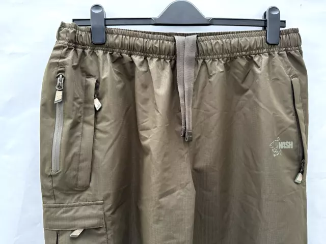 New Unworn Mens Nash Lightweight Waterproof Green Fishing Trousers Xl