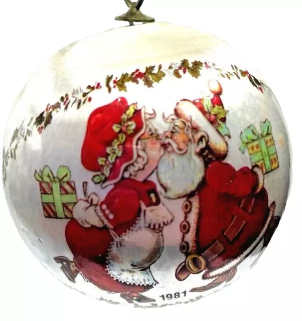 1981 P.C.A. International Christmas Satin Ball Ornament Santa Kissing Mrs. Claus