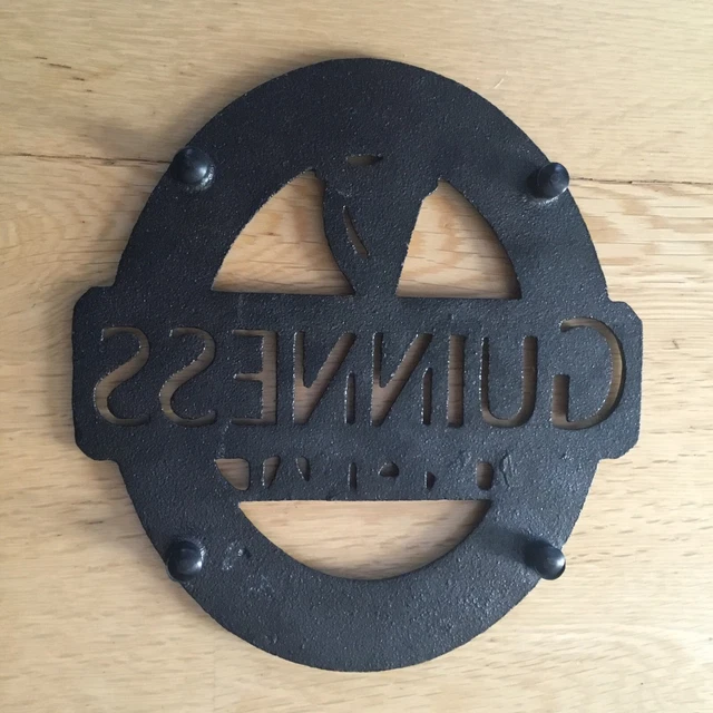 GUINNESS CAST IRON Hot Plate Trivet Official Product Four Metal Feet