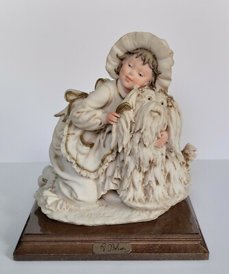 Statuina scultura in porcellana Capodimonte Auro Belcari 