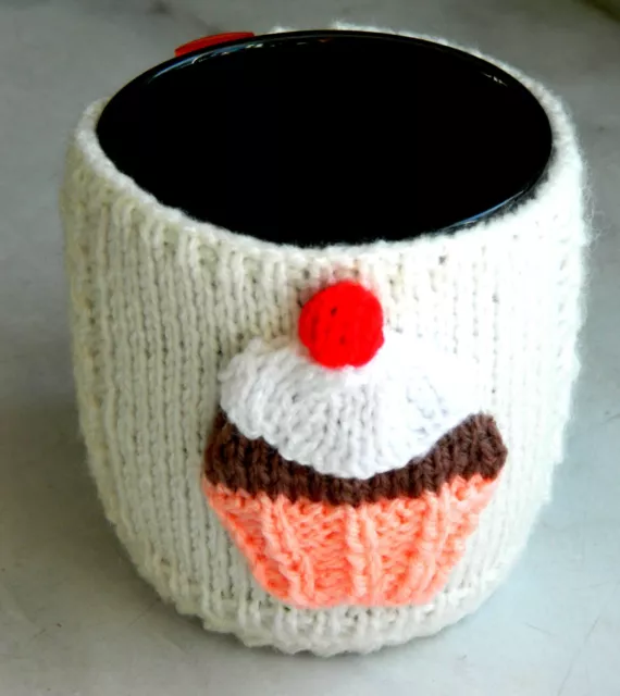 Hand Made Knitted Mug Cosy With Button Fastening Flower Cupcake