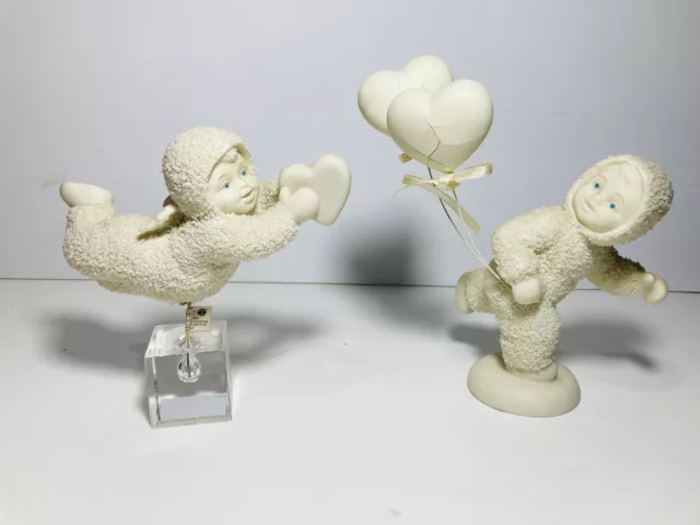 pair of Dept 56 Snowbabies Holding Hearts
