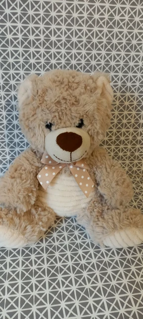 Peluche doudou ours beige  nœud à pois 25 cm max et Sax