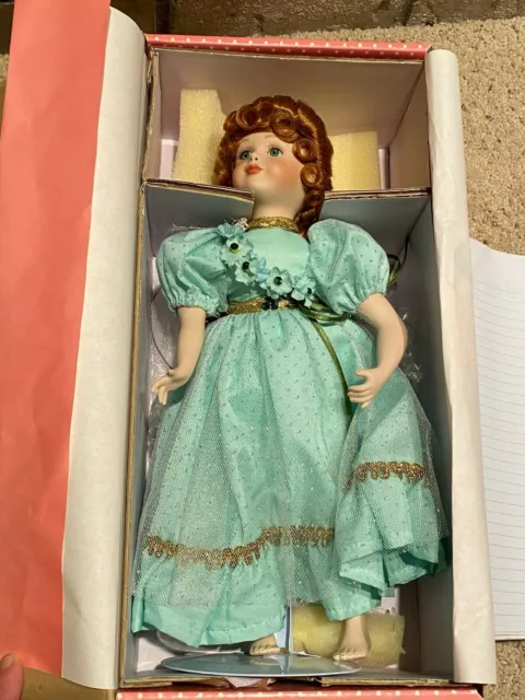 Paradise Galleries Treasury Collection Porcelain Red-headed Doll in Green Dress