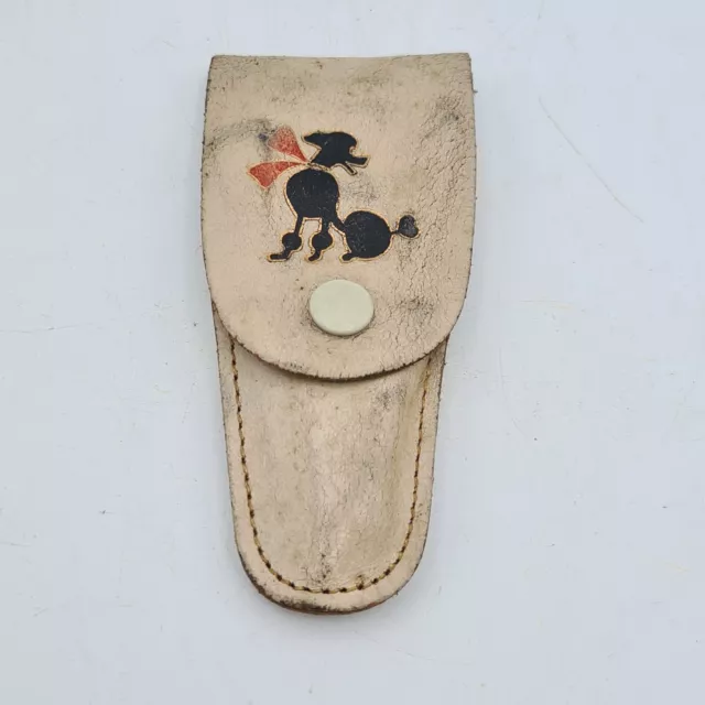 Vintage nail care kit in leather pouch with poodle dog design, made in Sheffield