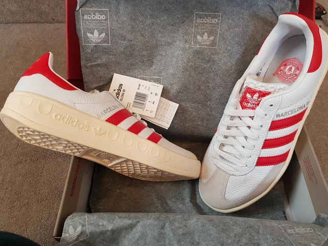 Man utd adidas trainers hot sale