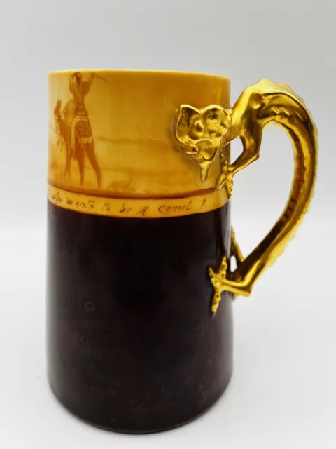 Novelty Stein with Unusual Gold Colored Dragon Handle. Camels On Top. 5.75” T.
