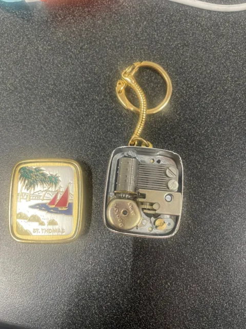 Vintage St Thomas Sankyo Music Box Key Chain Cover is loose-sold as is