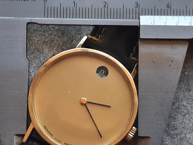 ZENITH-MOVADO MUSEUM 20.0040.366 QUADRANTE DORATO; MANUALE Zenith 2572. 35 mm.  9