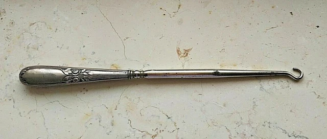 Antico uncino per allacciare stringhe stivali con manico in argento 800