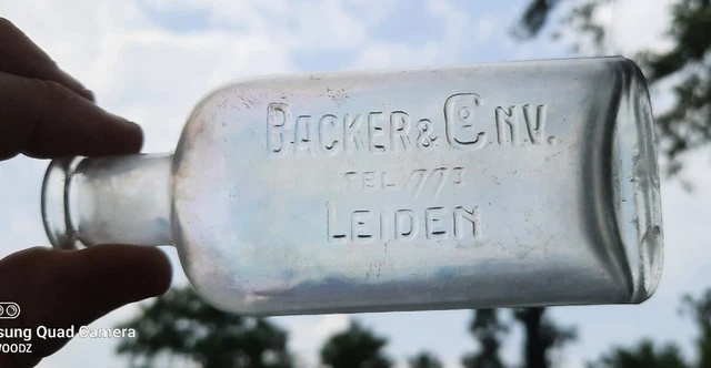 Backer & Co. N. V. Tel. 773 Leiden Germany Antique Bottle