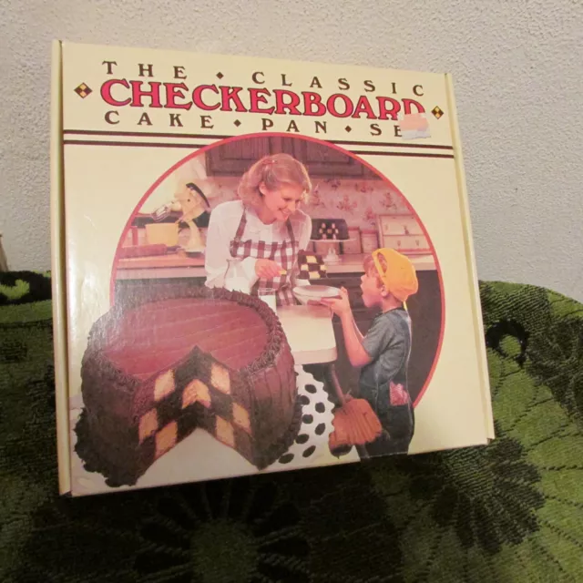 Unused. Chicago Metallic 3 Ring Checkerboard Cake Pan Set