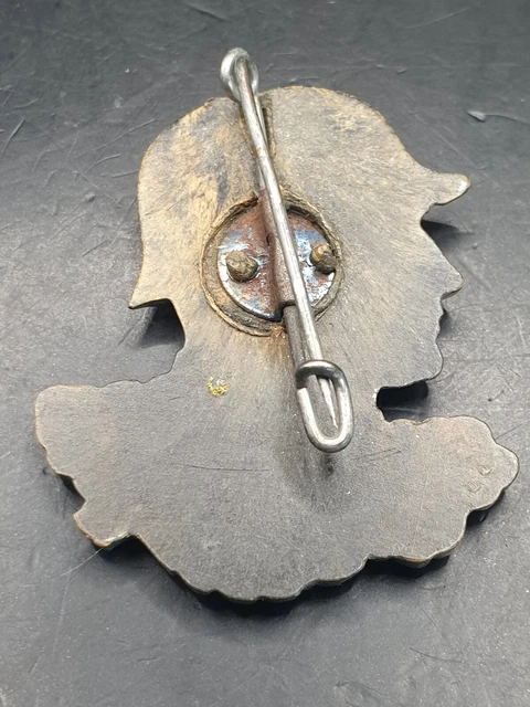 Un Casco In Acciaio Modello 1916 Con Rivestimento Camouflage, Vernice A Base Grigio Campo, Con