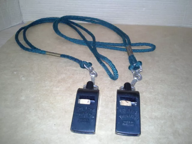 ( 2 ) Vintage.The ACME Thunderer black plastic whistle with Original Lanyard.VGC