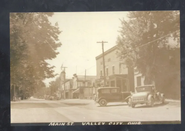 REAL PHOTO VALLEY CITY OHIO DOWNTOWN STREET SCENE 1930s CARS POSTCARD COPY