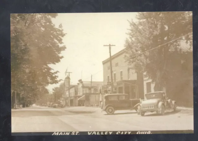 REAL PHOTO VALLEY CITY OHIO DOWNTOWN STREET SCENE 1930s CARS POSTCARD COPY