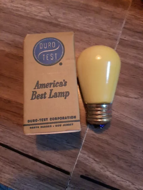 VINTAGE  DURO-TEST LIGHT BULBS 8000 user hours yellow bulb NOS