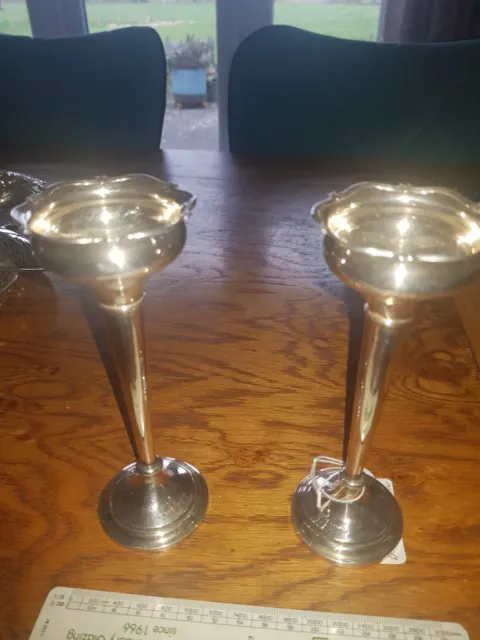 A pair of antique hallmarked silver posy/spill vases.