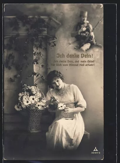 Foto-AK Ich denke Dein!..., Junge Frau mit Blume, Soldat in Uniform 1916