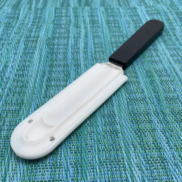 https://www.picclickimg.com/UIMAAOSw40VkfScF/Pampered-Chef-Cheese-Knife-1125-Slicer-Spreader-Stainless.webp